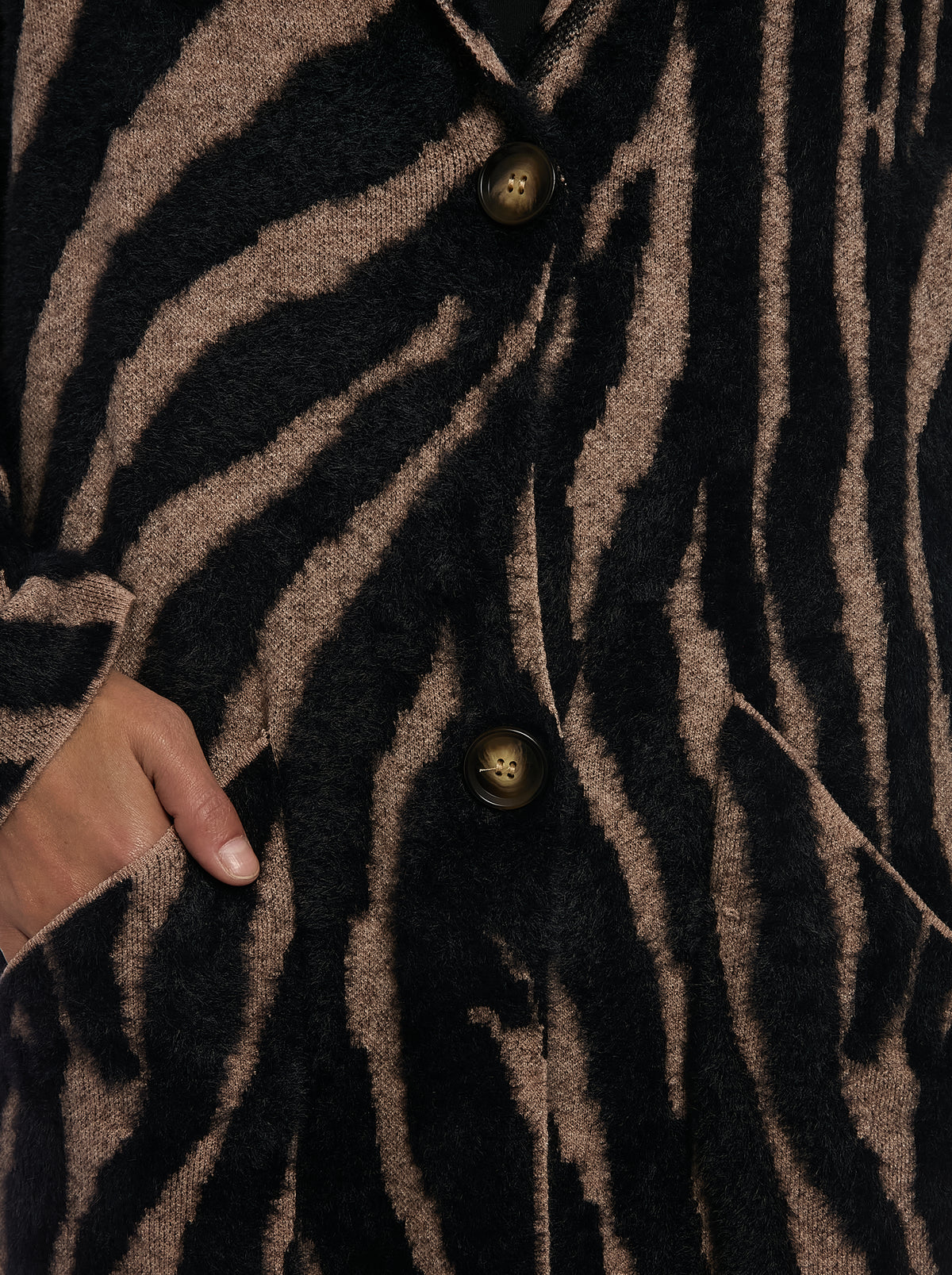 Zebra Eyelash Sweater in Zebra Camel, button and pocket detail